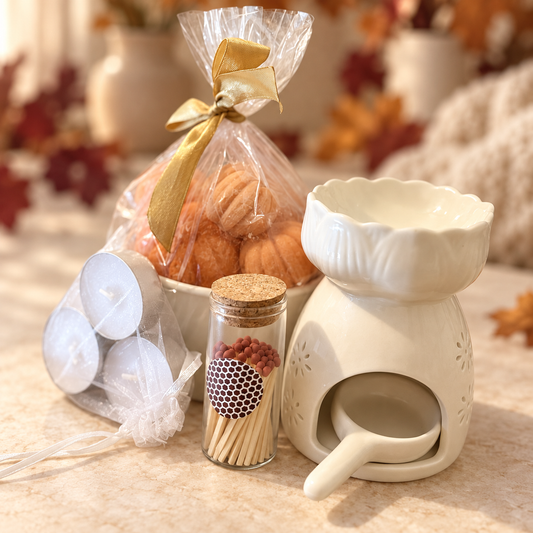 Wax warmer, pumpkin wax melts, tealights and matches included in the Autumn Cozy Gift Set